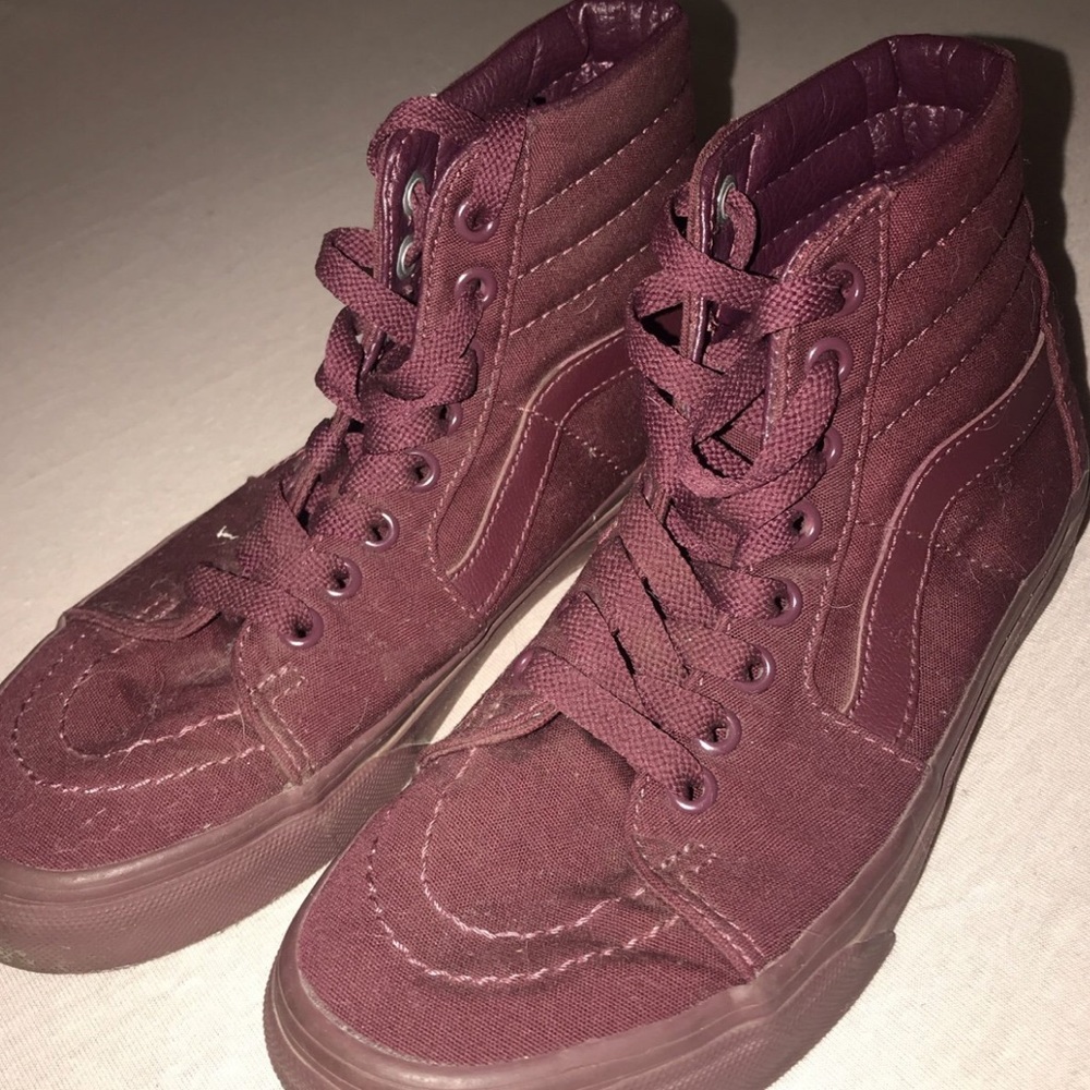 Maroon Vans high tops